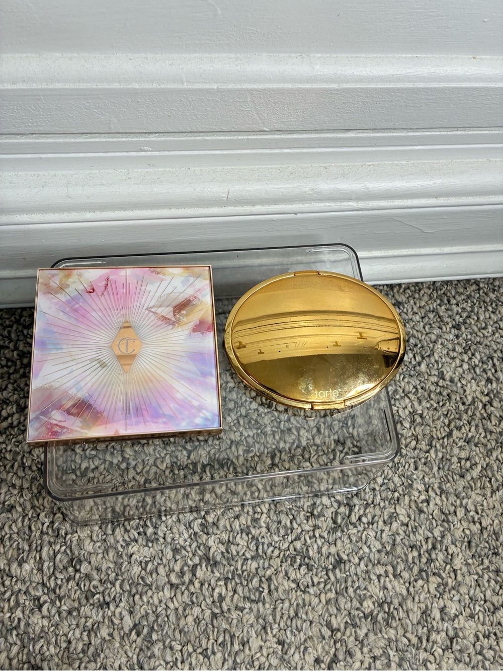 Charlotte Tilbury Glowgasm face palette and Tarte highlighter Set